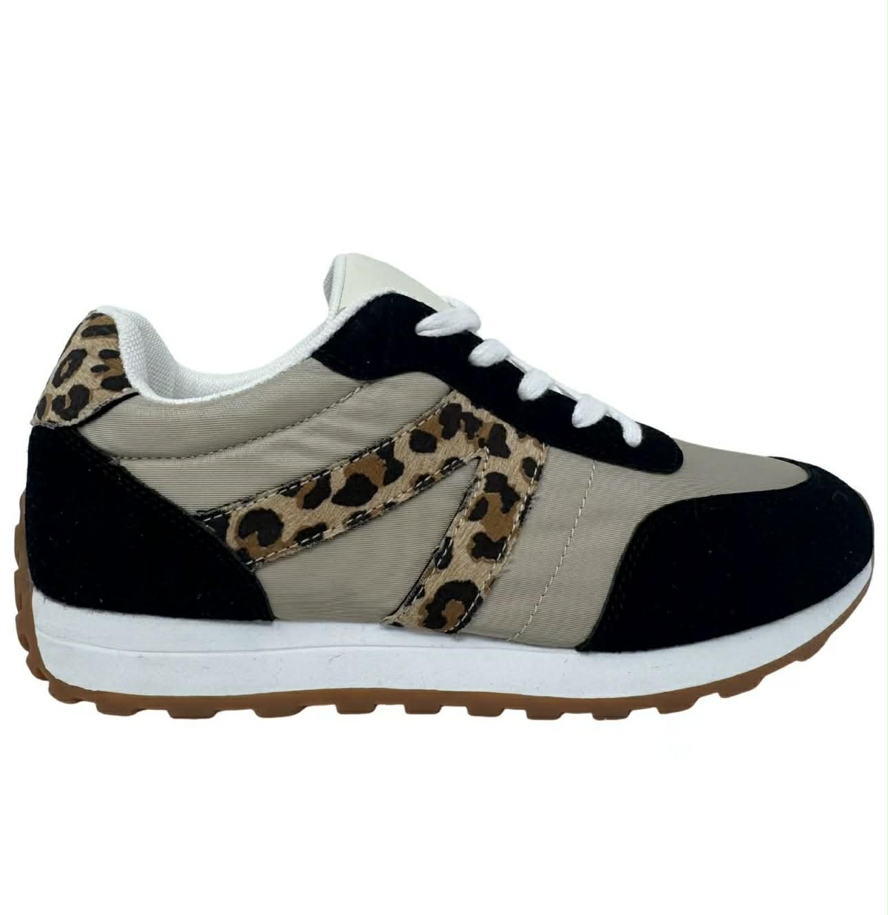 Sneaker with leopard print accents on a white background