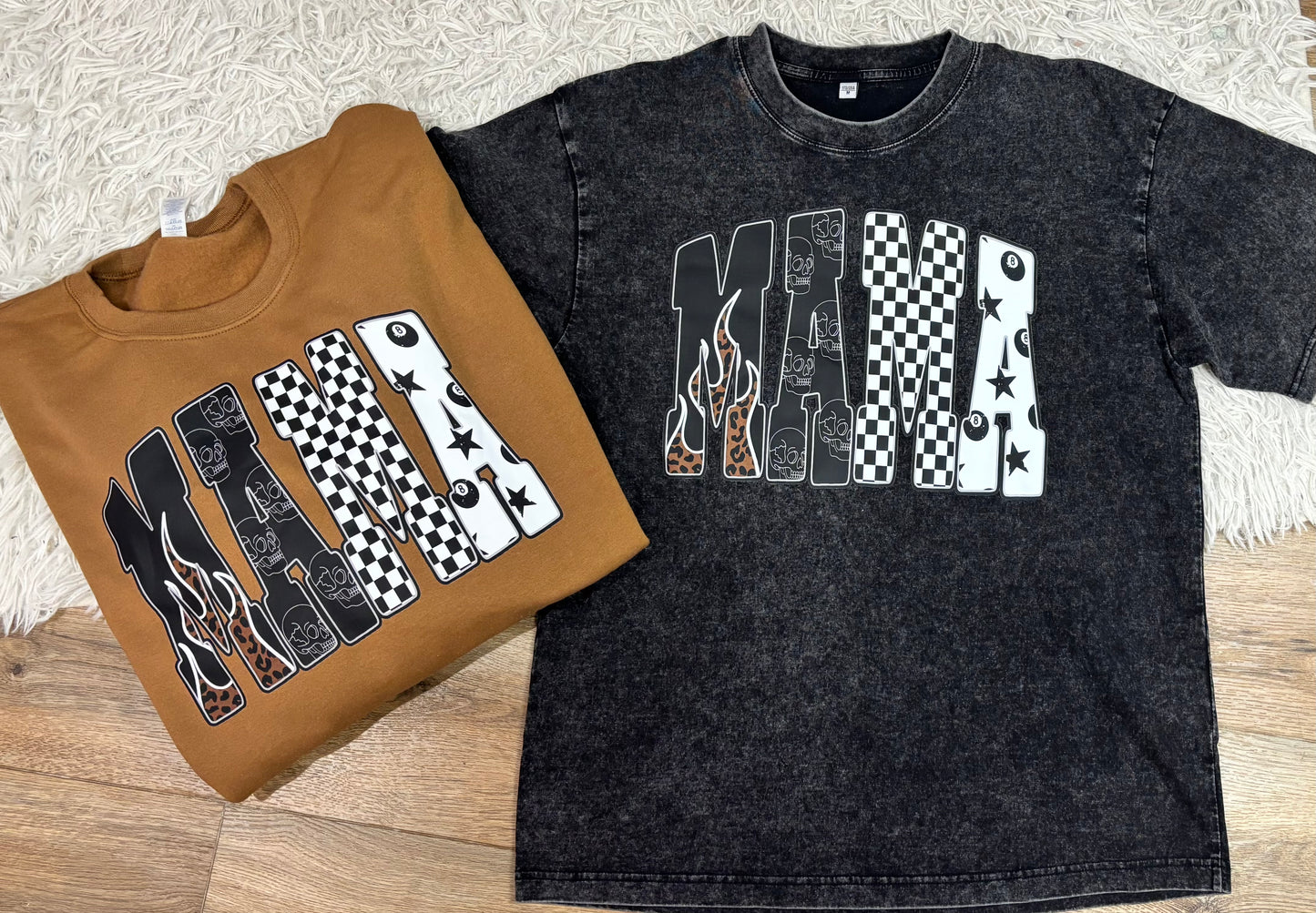 Two t-shirts, one brown and one black, with graphic designs on a textured surface.